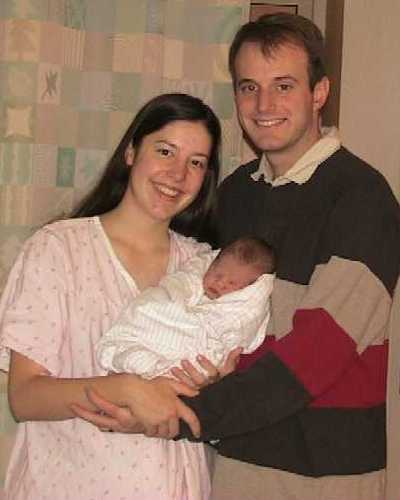 03 11  8  Lorena, Scott, and first baby after the birth, in hospital red35pct crpd